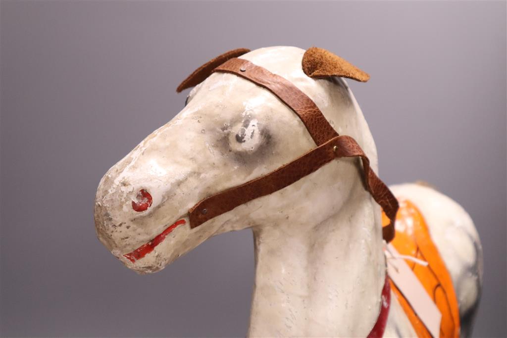 A pre-war papier mache pull-along horse